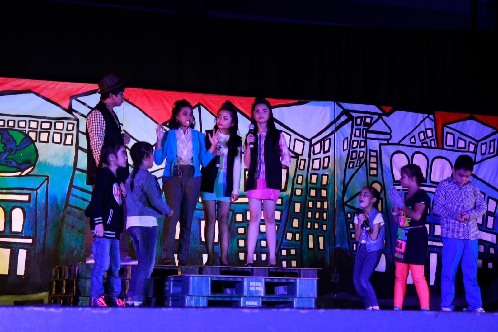 Students performing on stage